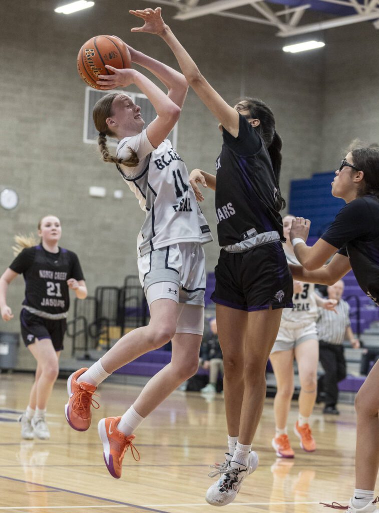 Glacier Peak’s Zoey Ritter makes a jump shot during the 4A district loser-out playoff game against North Creek on Thursday, Feb. 20, 2025 in Kirkland, Washington. (Olivia Vanni / The Herald)
