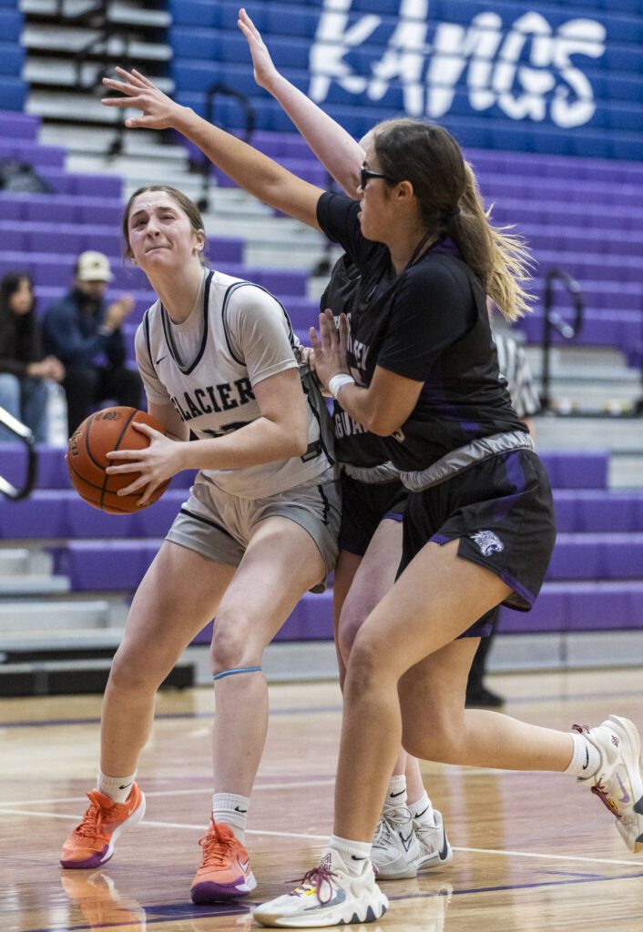 Glacier Peak’s Samantha Thoma tries to find an open shot while being guarded during the 4A district loser-out playoff game against North Creek on Thursday, Feb. 20, 2025 in Kirkland, Washington. (Olivia Vanni / The Herald)
