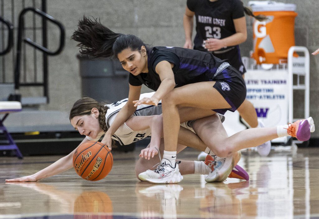 Glacier Peak’s Lillian Riechelson lays out for a loose ball during the 4A district loser-out playoff game against North Creek on Thursday, Feb. 20, 2025 in Kirkland, Washington. (Olivia Vanni / The Herald)
