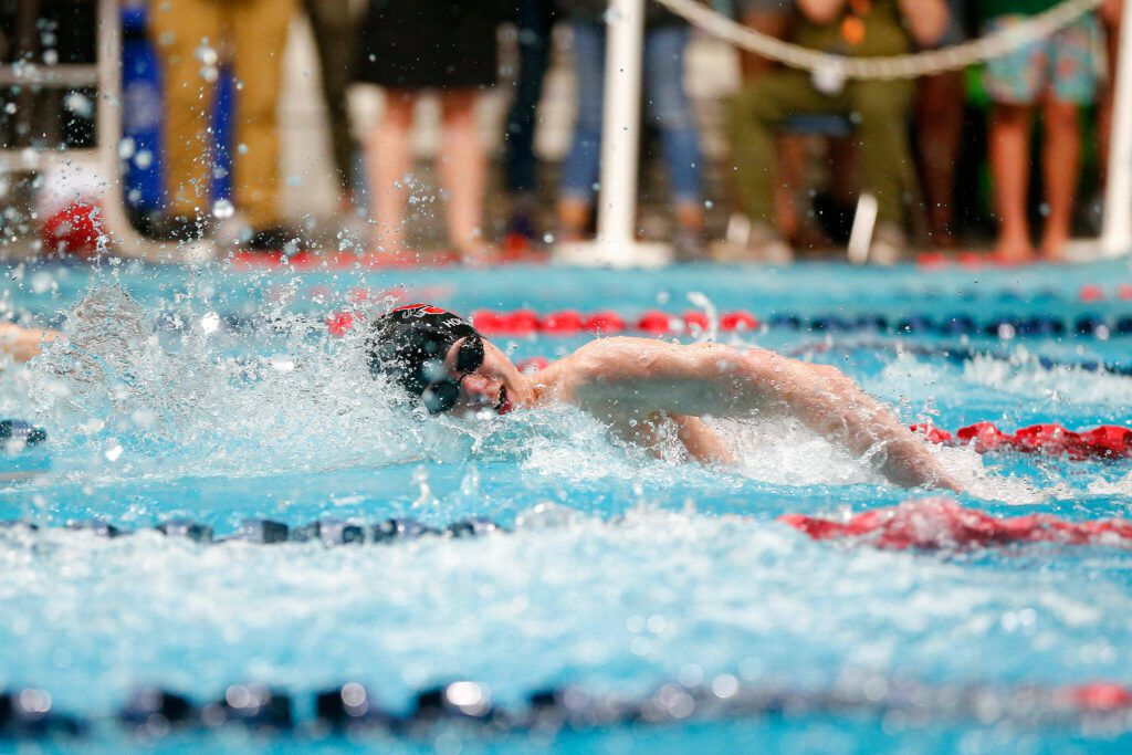 Snohomish swimmer Torsten Hokanson anchors his team in the 400 yard freestyle relay consolation race during the WIAA 3A Boys Swim and Dive Championships on Saturday, Feb. 17, 2024, at the Weyerhaeuser King County Aquatic Center in Federal Way, Washington. (Ryan Berry / The Herald)

