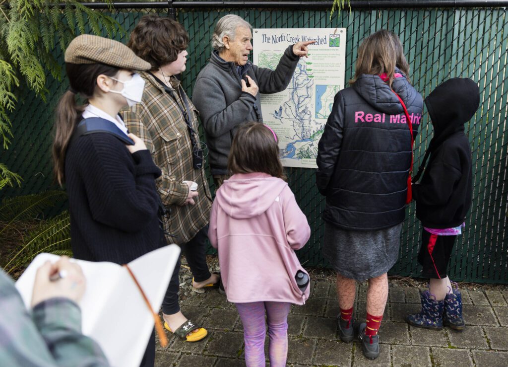 Tom Murdoch leads The Clearwater School on a nature walk at the Northwest Stream Center on Wednesday, March 5, 2025 in Everett, Washington. (Olivia Vanni / The Herald)

