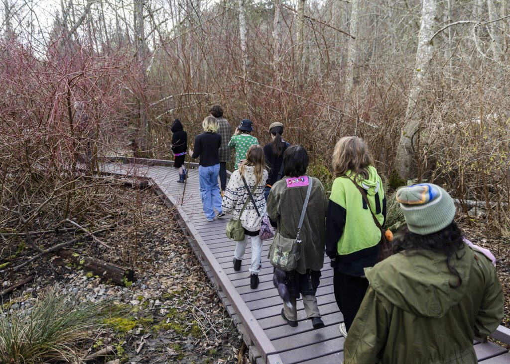 Students from The Clearwater School go on a nature walk at the Northwest Stream Center on Wednesday, March 5, 2025 in Everett, Washington. (Olivia Vanni / The Herald)
