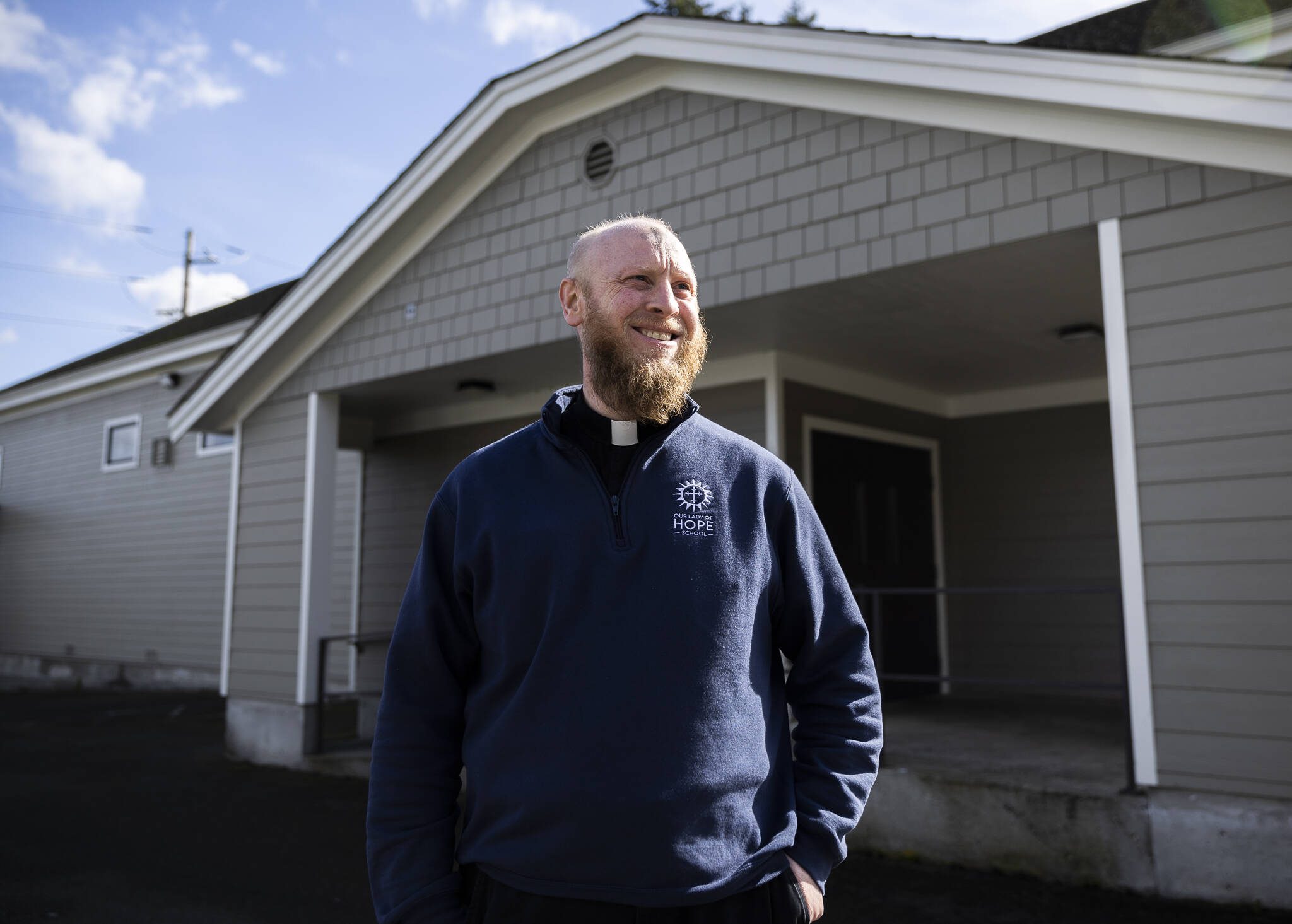 Our Lady of Hope Pastor Joseph Altenhofen outside of his parish’s building that will be the new home of Hope N Wellness on Wednesday, March 5, 2025 in Everett, Washington. (Olivia Vanni / The Herald)
