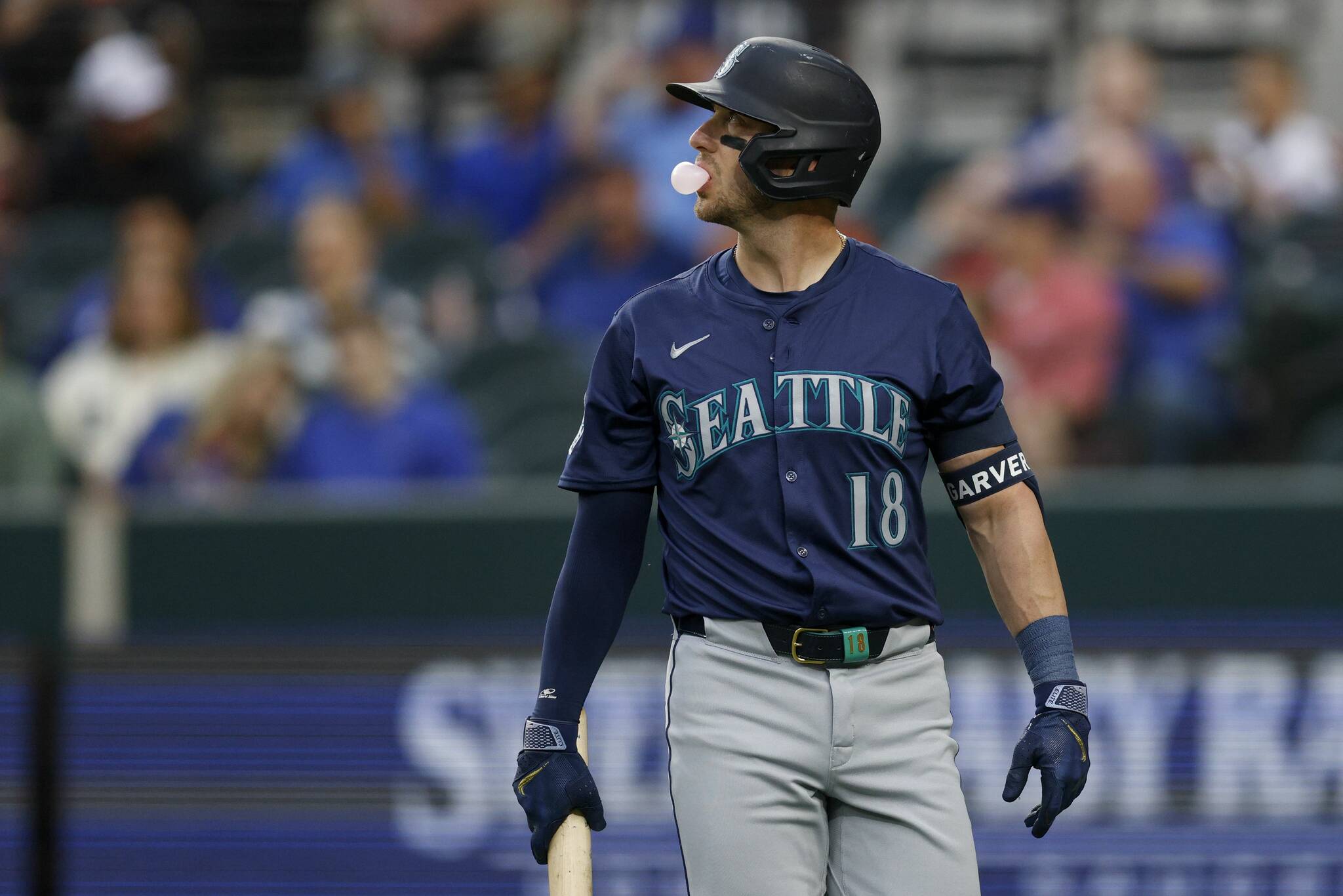 Elías Valverde II / Tribune News Service
Seattle Mariners designated hitter Mitch Garver (18) walks to the dugout after striking out against the Texas Rangers last April in Arlington, Texas.