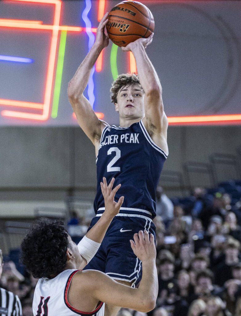 Glacier Peak’s Jo Lee makes a 3-point shot during the 4A boys quarterfinal game against Camas on Thursday, March 6, 2025 in Tacoma, Washington. (Olivia Vanni / The Herald)
