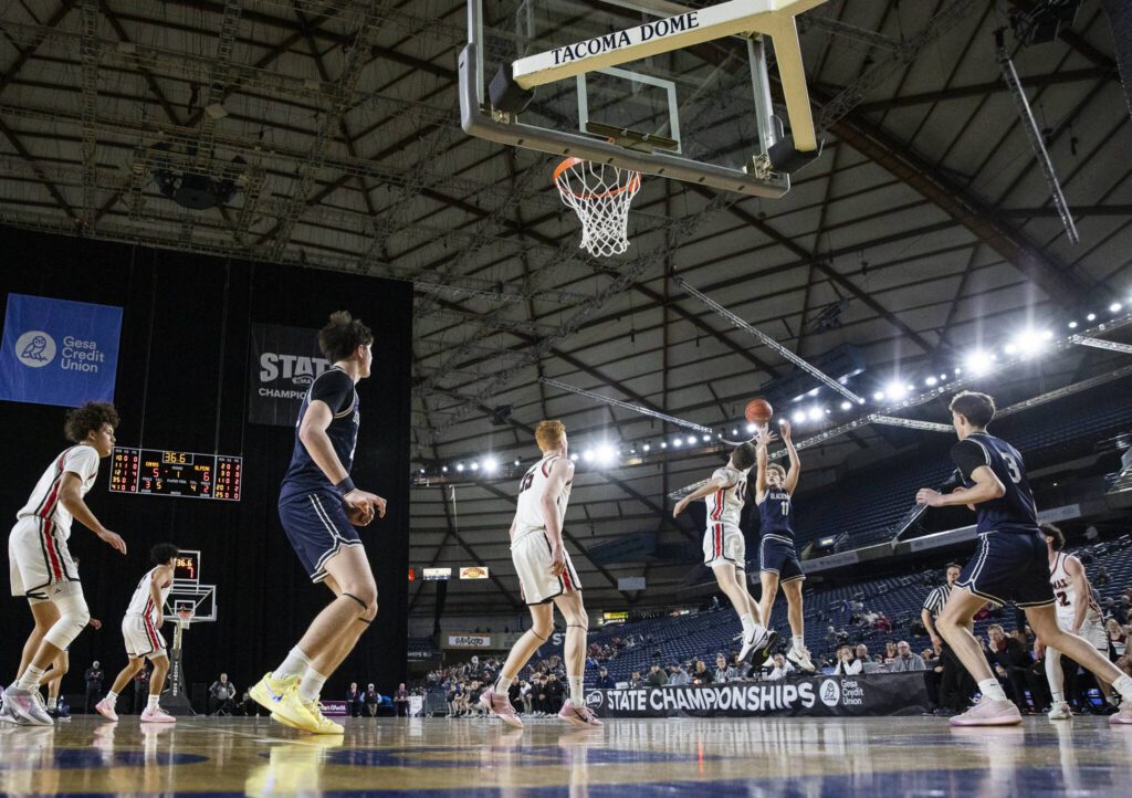 Glacier Peak’s Reed Nagel makes a 3-point shot during the 4A boys quarterfinal game against Camas on Thursday, March 6, 2025 in Tacoma, Washington. (Olivia Vanni / The Herald)
