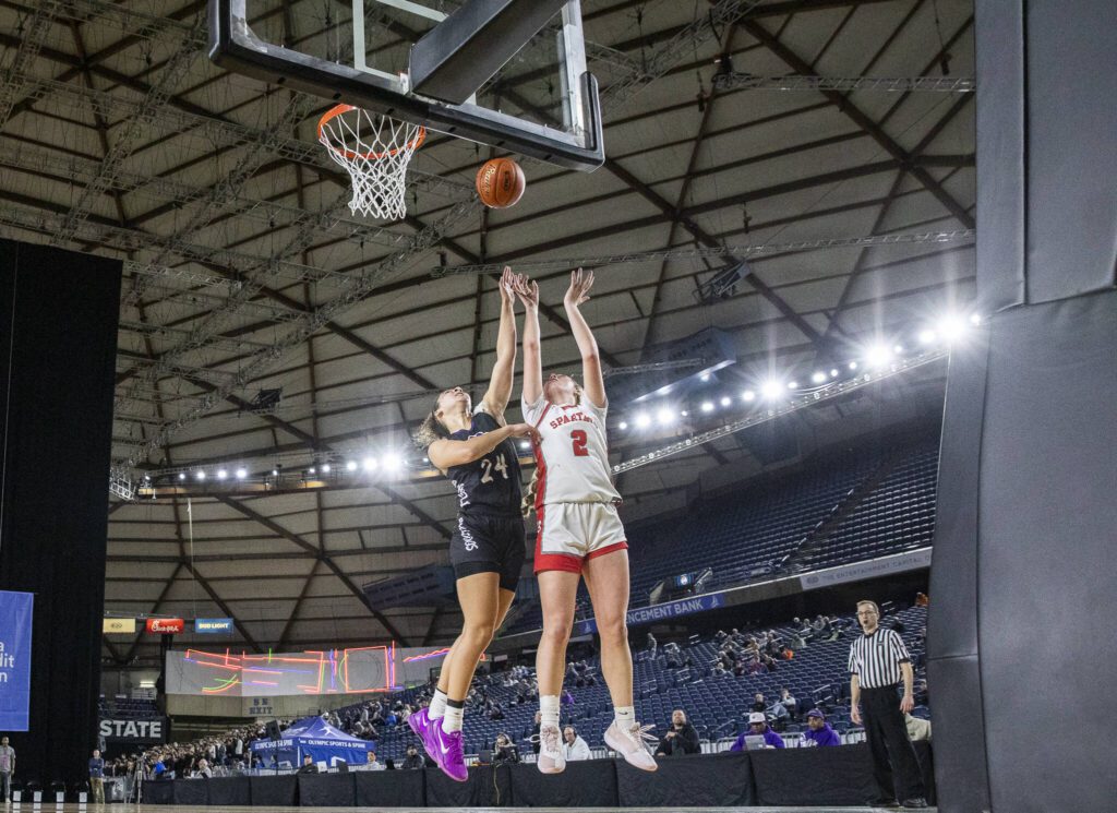 Stanwood’s Ellalee Wortham makes a layup during the 3A girls quarterfinal game against Garfield on Thursday, March 6, 2025 in Tacoma, Washington. (Olivia Vanni / The Herald)
