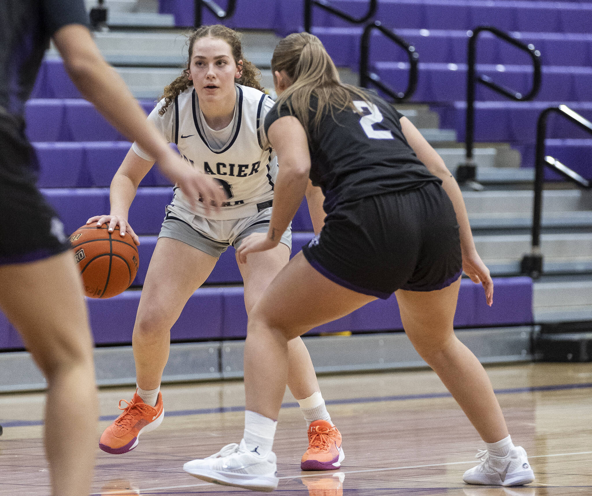 Glacier Peak’s Brynna Pukis looks for an open teammate during the 4A district loser-out playoff game against North Creek on Thursday, Feb. 20, 2025 in Kirkland, Washington. (Olivia Vanni / The Herald)
