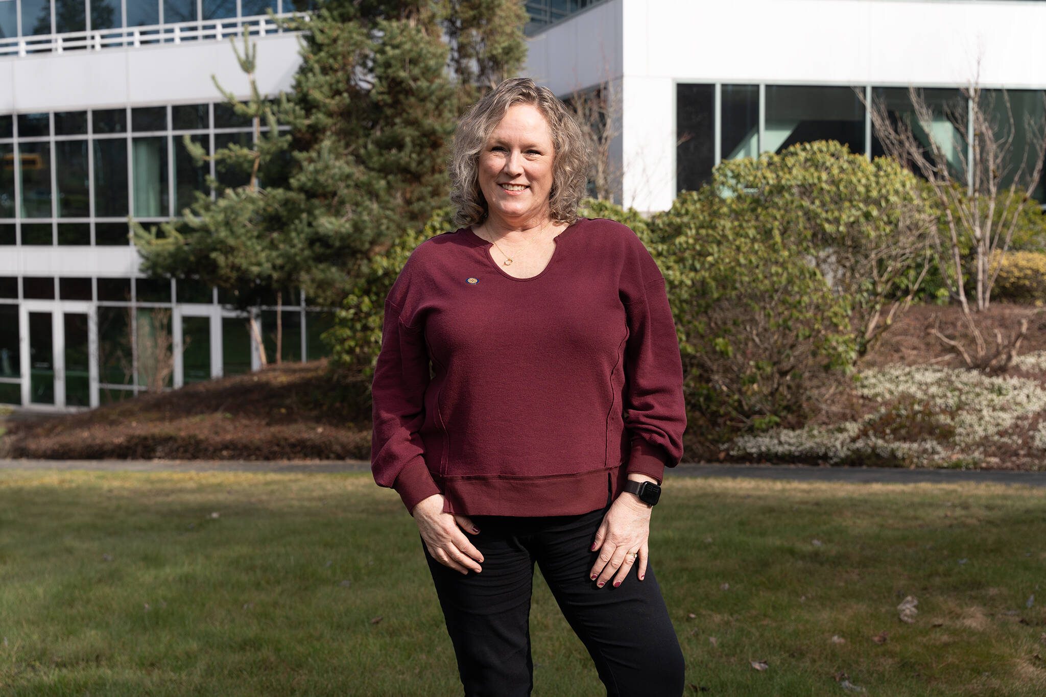 Carrie Radcliff, the newest publisher of The Daily Herald, poses for a photo Friday, March 7, 2025, in Everett, Washington. (Will Geschke / The Herald)