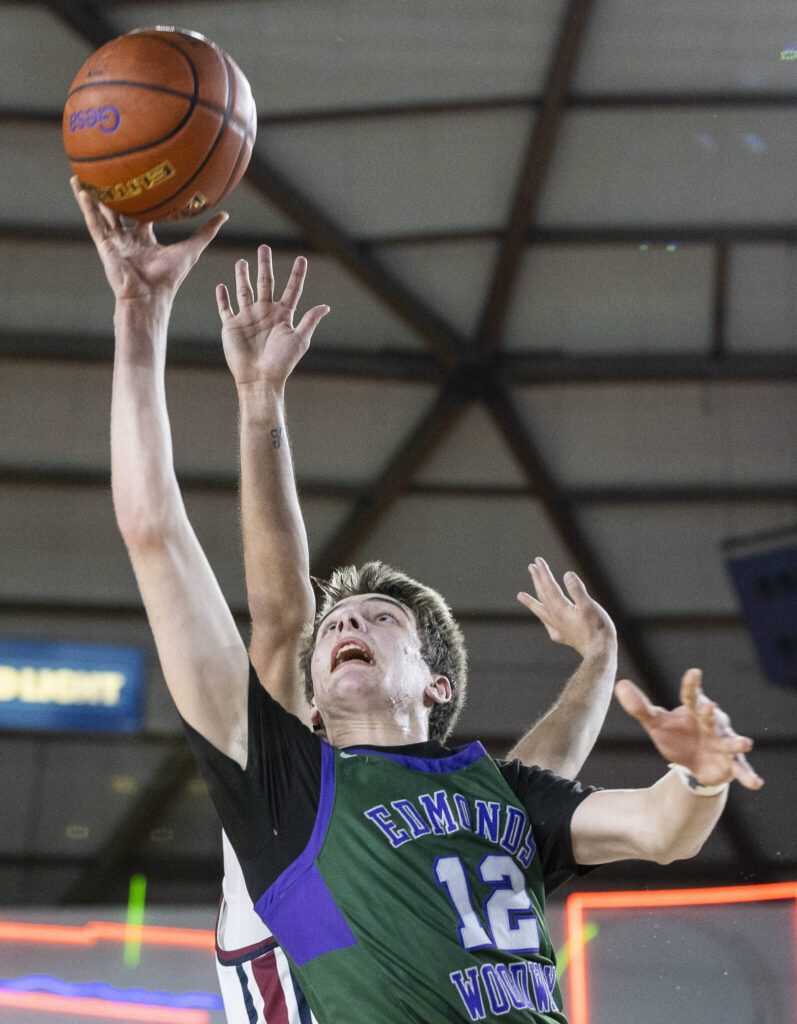 Edmonds-Woodway’s William Alseth makes a layup during the 3A boys semifinal game against Mt. Spokane on Friday, March 7, 2025 in Tacoma, Washington. (Olivia Vanni / The Herald)

