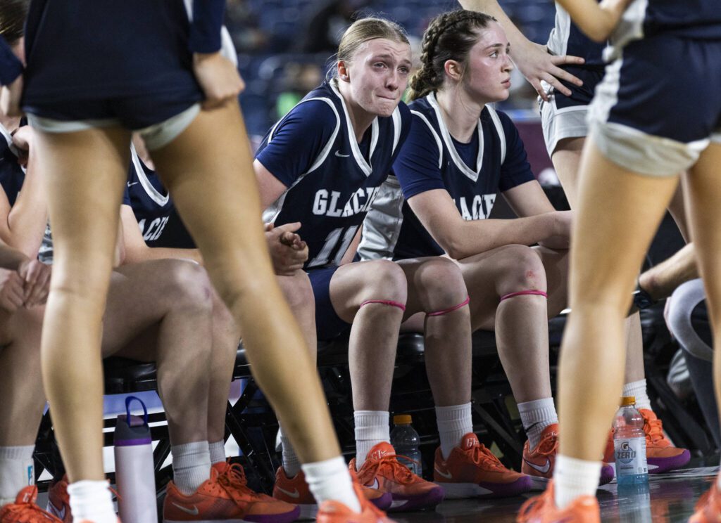 Glacier Peak’s Zoey Ritter becomes emotional in the huddle during the 4A girls semifinal game against Davis on Friday, March 7, 2025 in Tacoma, Washington. (Olivia Vanni / The Herald)
