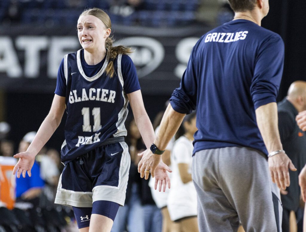 Glacier Peak’s Zoey Ritter cries after a technical foul is called on her during the 4A girls semifinal game against Davis on Friday, March 7, 2025 in Tacoma, Washington. (Olivia Vanni / The Herald)
