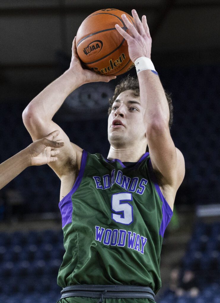 Edmonds-Woodway’s Cam Hiatt makes a jump shot during the 3A boys championship game against Rainier Beach on Saturday, March 8, 2025 in Tacoma, Washington. (Olivia Vanni / The Herald)
