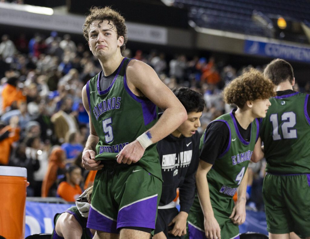 Edmonds-Woodway’s Cam Hiatt becomes emotional after losing the 3A boys championship game to Rainier Beach on Saturday, March 8, 2025 in Tacoma, Washington. (Olivia Vanni / The Herald)
