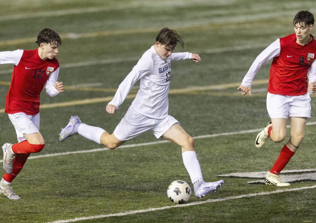 Glacier Peak’s Trevor Kilgore kicks the ball during the game against Snohomish on Wednesday, March 12, 2025 in Snohomish, Washington. (Olivia Vanni / The Herald)
