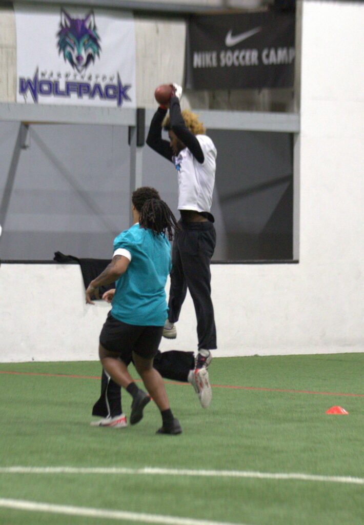 Wolfpack receiver Aakiel Greer catches a pass during the Arena Football One team’s practice at Snohomish Sports Dome on Thursday, March 13, 2025. (Aaron Coe / The Herald)
