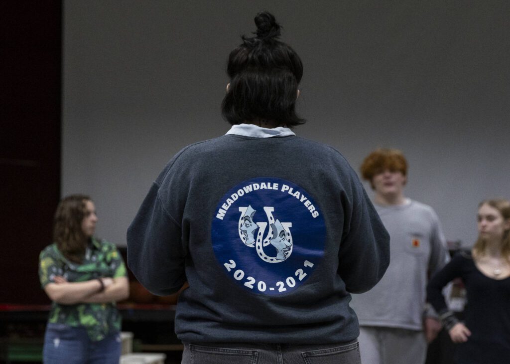 Jaqueline Meyners talks to his actors before they start a full run-through of their play, Eurydice, at rehearsal on Monday, March 17, 2025, in Lynnwood, Washington. (Olivia Vanni / The Herald)
