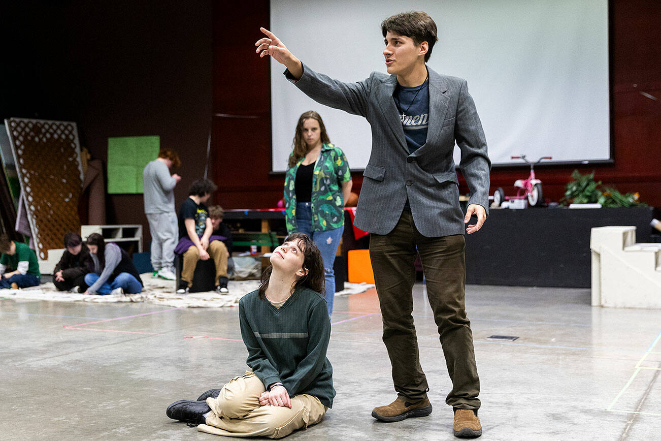 Lucy Knudson, left, and Tyler Pennington, right, perform in character during a full run-through of the play Eurydice at rehearsal on Monday, March 17, 2025 in Meadowdale, Washington. (Olivia Vanni / The Herald)