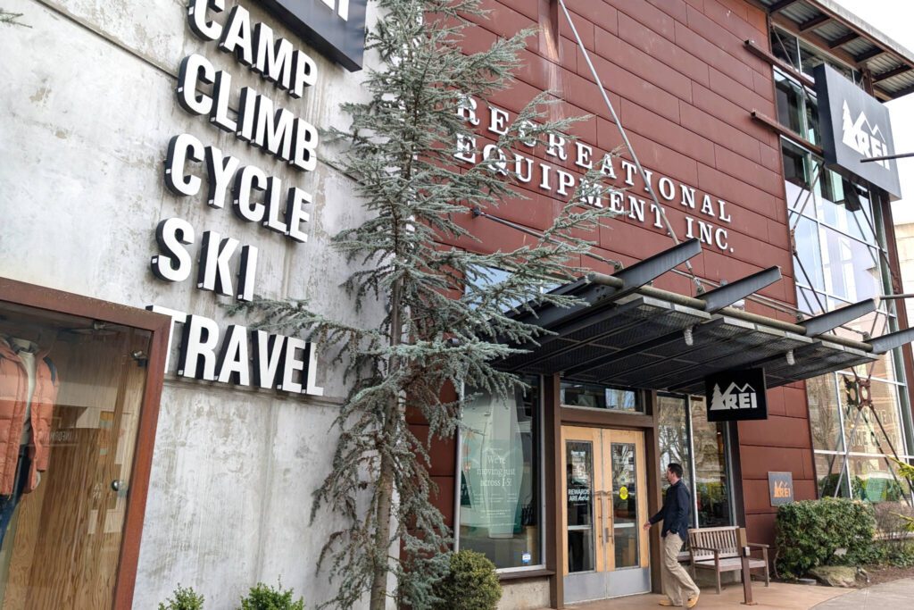 A customer walks into an REI store at its Alderwood location Wednesday, March 19, 2025, in Lynnwood, Washington. On Sunday, the store will close its doors before reopening at its new location at the Alderwood Parkway Plaza Shopping Center on March 28. (Mike Henneke / The Herald)

