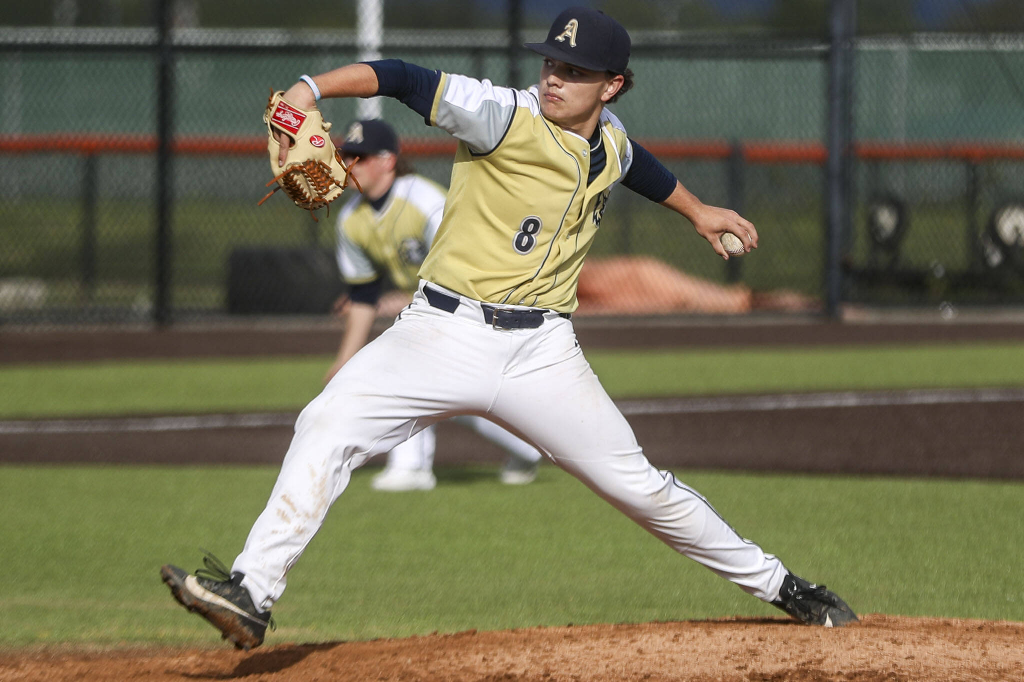 Arlington’s Aiden Jones (8) pitches during a baseball game between Monroe and Arlington at Monroe High School on Friday, April 26, 2024 in Monroe, Washington. Monroe secured a win in an eighth inning, 4-3. (Annie Barker / The Herald)