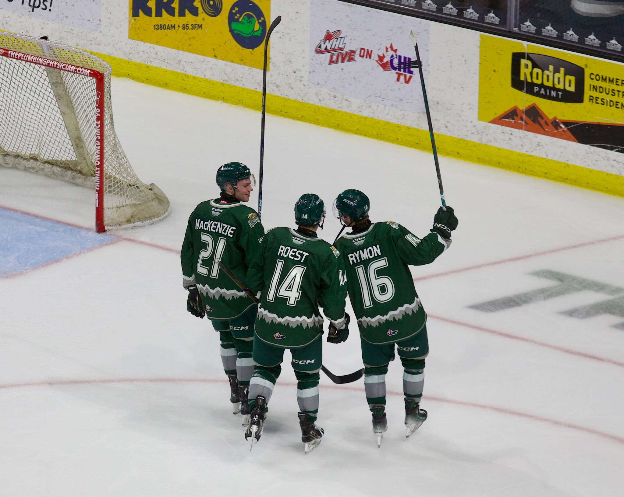 Everett Silvertips overage forwards (from left to right) Tyler MacKenzie, Austin Roest and Dominik Rymon take a lap and salute the crowd at Angel of the Winds Arena after winning the regular season home finale 5-0 against the Wenatchee Wild in Everett, Washington on March 21, 2025. WHL teams are allowed just three 20-year-old — or ‘overage’ — players on their roster, and the trio’s WHL careers will end following the Silvertips’ upcoming postseason. (Joe Pohoryles / The Herald)