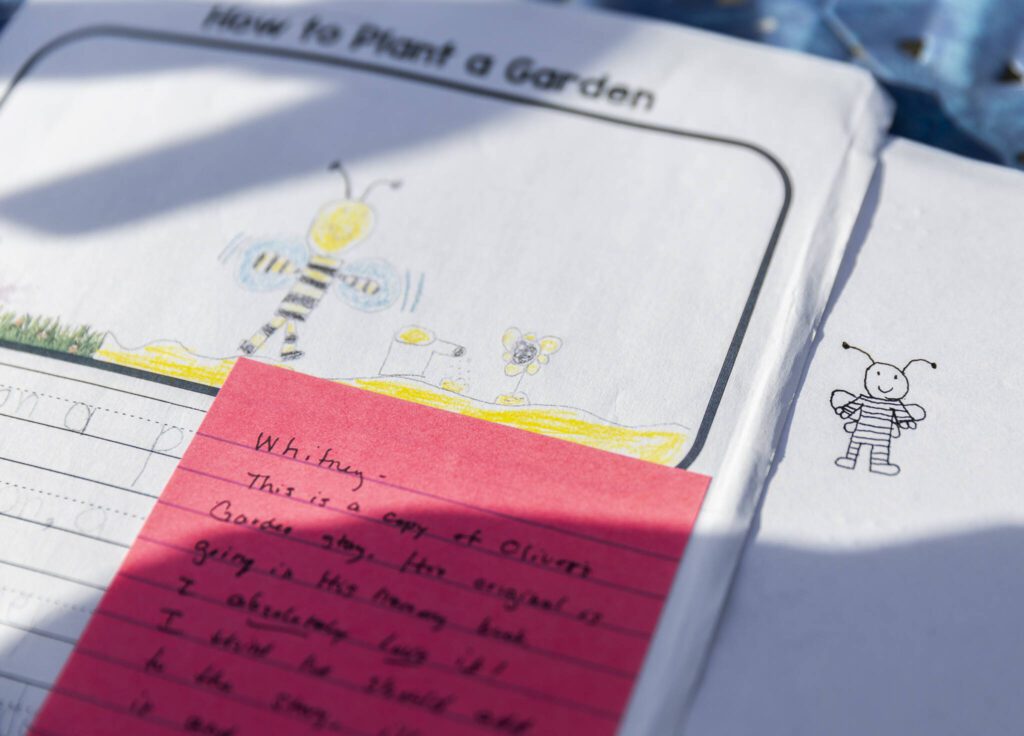 The original drawing and class assignment that inspired Popa’s book along with a note from his teacher to his mother on Tuesday, March 25, 2025 in Edmonds, Washington. (Olivia Vanni / The Herald)
