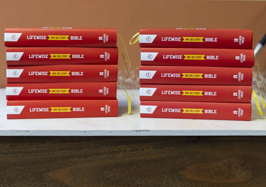 LifeWise Bibles available for students in their classroom set up at New Hope Assembly on Monday, April 14, 2025 in Everett, Washington. (Olivia Vanni / The Herald)
