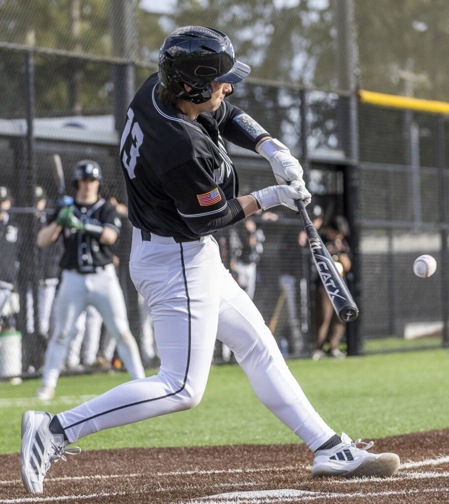 Jackson’s Colby Bossert gets a hit during the game against Edmonds-Woodway on Wednesday, April 2, 2025 in Edmonds, Washington. (Olivia Vanni / The Herald)
