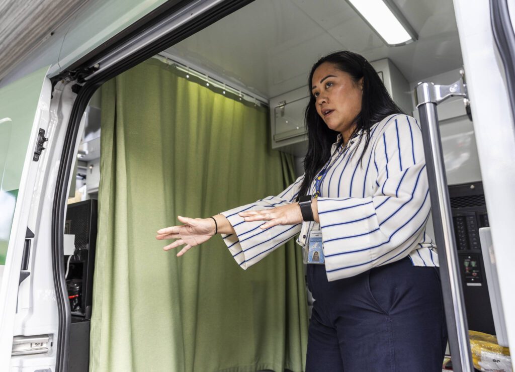 Pia Sampaga-Khim shows how two patients can be treated at the same time in the Snohomish County Health Department’s new Health on Wheels Van on Wednesday, April 9, 2025, in Everett, Washington. (Olivia Vanni / The Herald)
