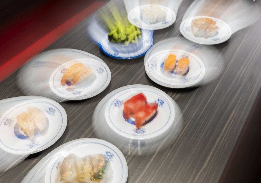 A selection of different food options ranging from sushi rolls to nigiri, at Kura Revolving Sushi Bar on Monday, April 7, 2025 in Lynnwood, Washington. (Olivia Vanni / The Herald)
