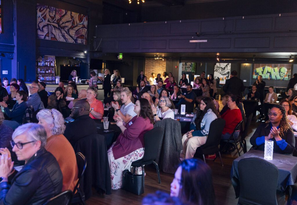 People applaud during the 2025 Emerging Leaders awards at APEX Everett on Tuesday, April 8, 2025, in Everett, Washington. (Olivia Vanni / The Herald)
