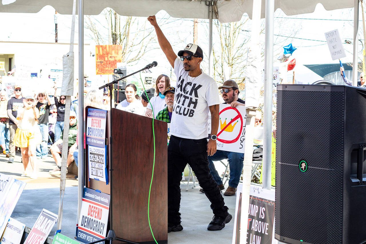 Myke Singleton, a 66-year-old Army veteran, speaks to a large crowd during the “Hands Off!” rally on Saturday, April 5, 2025, in Everett, Washington. (Aaron Kennedy / The Herald)