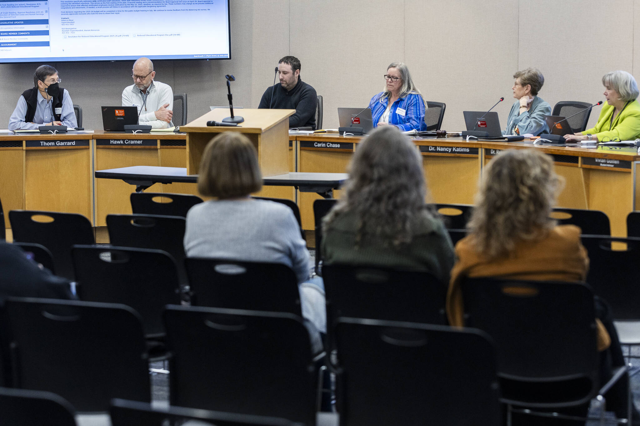 The Edmonds School Board discusses budget cuts during a school board meeting on Tuesday, April 15, 2025 in Edmonds, Washington. (Olivia Vanni / The Herald)