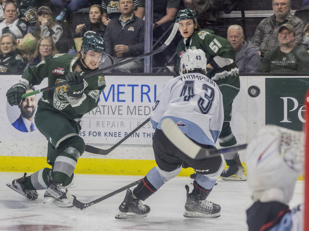 Everett Silvertips’ defenceman Tarin Smith takes a shot on goal during the second round WHL playoff game against the Portland Winterhawks on Friday, April 11, 2025 in Everett, Washington. (Olivia Vanni / The Herald)
