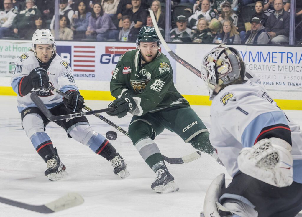 Everett Silvertips’ forward Tyler MacKenzie takes a shot on goal during the second round WHL playoff game against the Portland Winterhawks on Friday, April 11, 2025 in Everett, Washington. (Olivia Vanni / The Herald)
