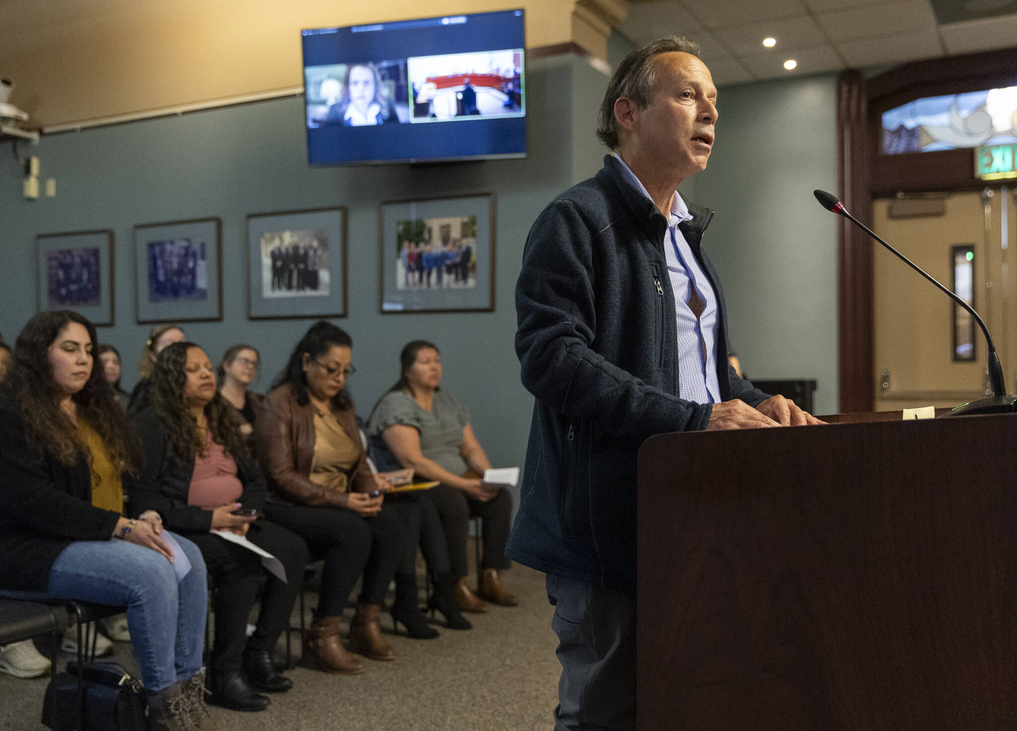 Connect Casino Road Director Alvaro Gullien speaks at an Everett City Council meeting to share community thoughts regarding affordable housing and preventing displacement of those who live along Casino Road on Wednesday, April 16, 2025 in Everett, Washington. (Olivia Vanni / The Herald)