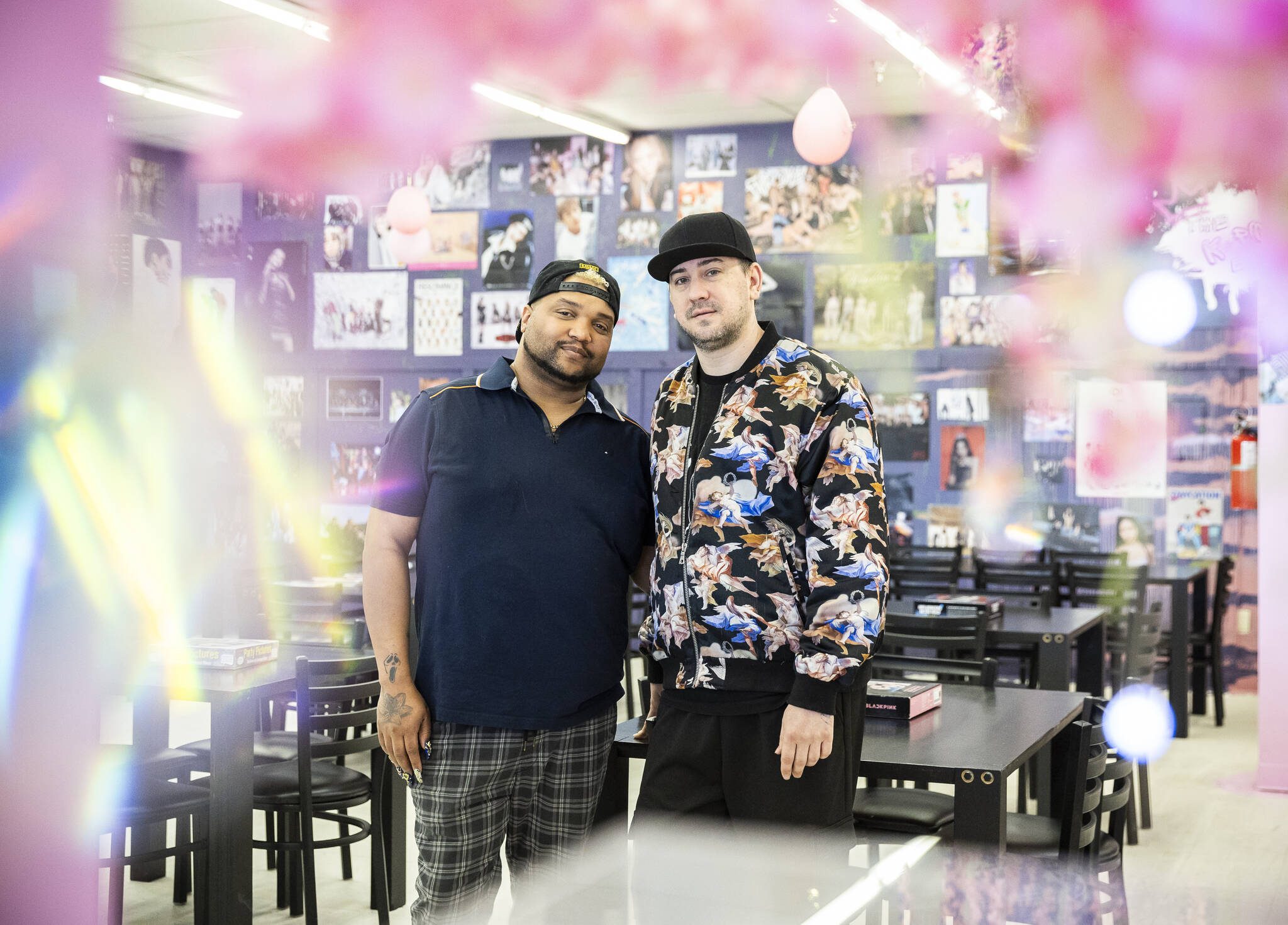 The K-POP Empire store owners Todd Dickinson and Ricky Steinlars at their new store location on Thursday, April 17, 2025, in Lynnwood, Washington. (Olivia Vanni / The Herald)