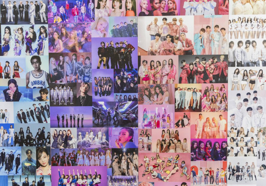 A K-pop poster backdrop for photos at The K-POP Empire on Thursday, April 17, 2025, in Lynnwood, Washington. (Olivia Vanni / The Herald)

