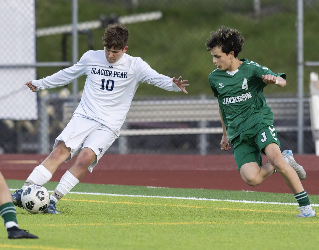 Glacier Peak’s Tyler Larsen takes a shot on goal during the game against Jackson on Tuesday, April 15, 2025 in Everett, Washington. (Olivia Vanni / The Herald)
