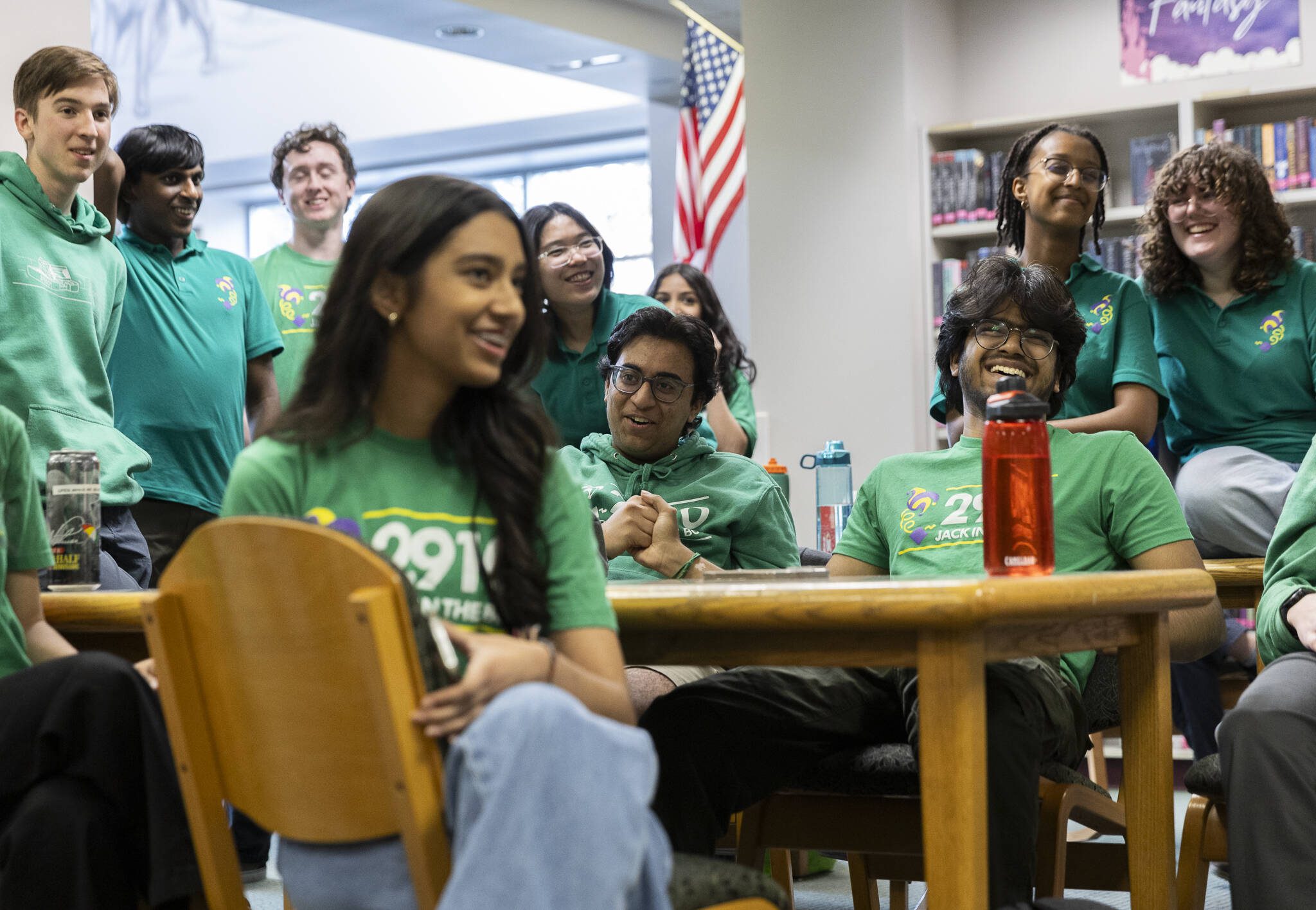 Members of the Team 2910 Jack in the Bot laugh during a celebratory meeting on Thursday, April 24, 2025 in Mill Creek, Washington. (Olivia Vanni / The Herald)
