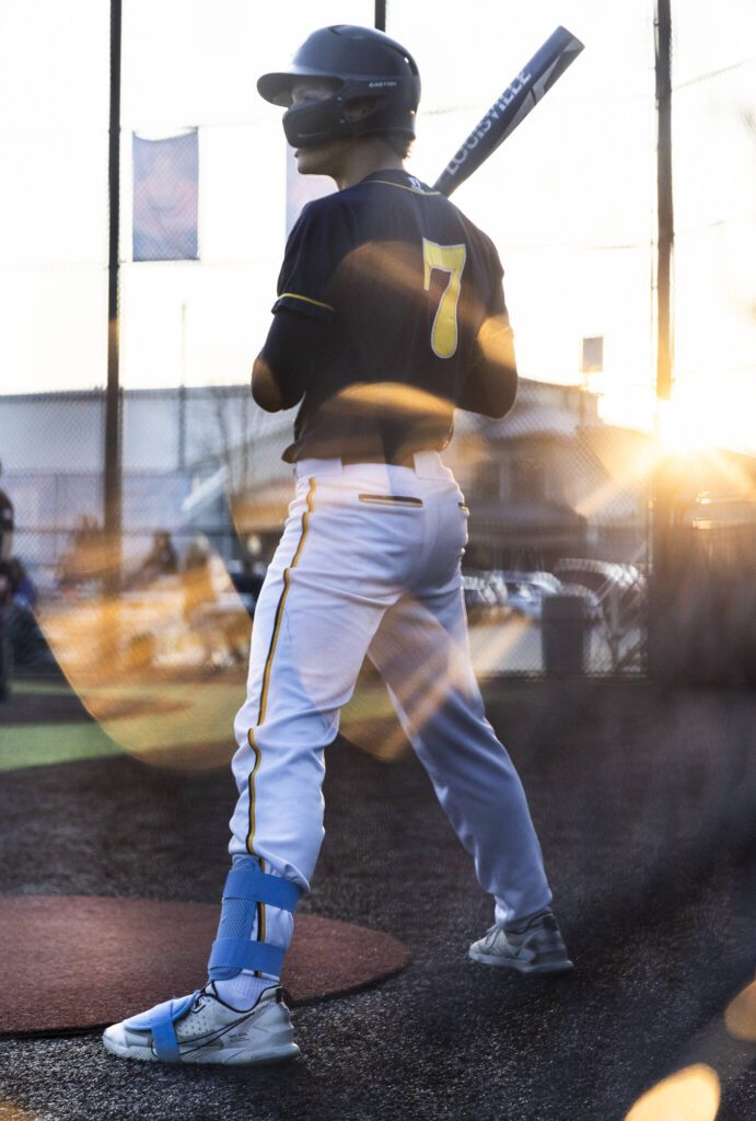 Everett’s Owen Brunni warms up in the on deck circle during the game against Monroe on Wednesday, April 23, 2025 in Monroe, Washington. (Olivia Vanni / The Herald)
