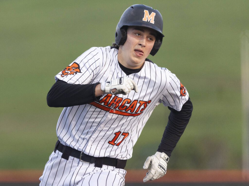 Monroe’s AJ Welch sticks his tongue out as he runs the bases during the game against Everett on Wednesday, April 23, 2025 in Monroe, Washington. (Olivia Vanni / The Herald)
