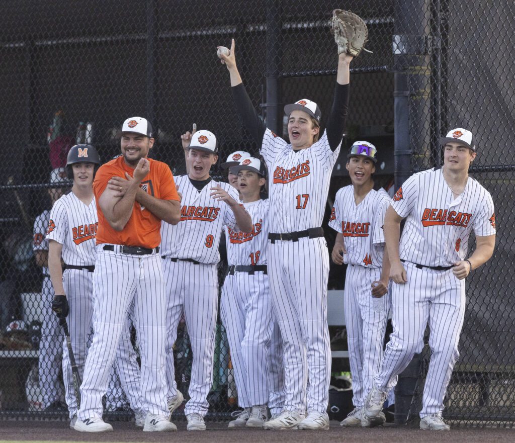The Monroe dugout clears in celebrate of their teammates hit during the game against Everett on Wednesday, April 23, 2025 in Monroe, Washington. (Olivia Vanni / The Herald)
