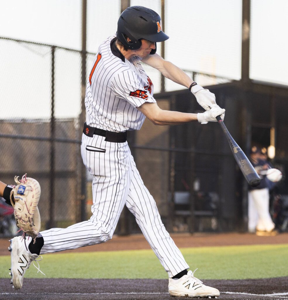 Monroe’s Caleb Campbell gets a hit during the game against Everett on Wednesday, April 23, 2025 in Monroe, Washington. (Olivia Vanni / The Herald)
