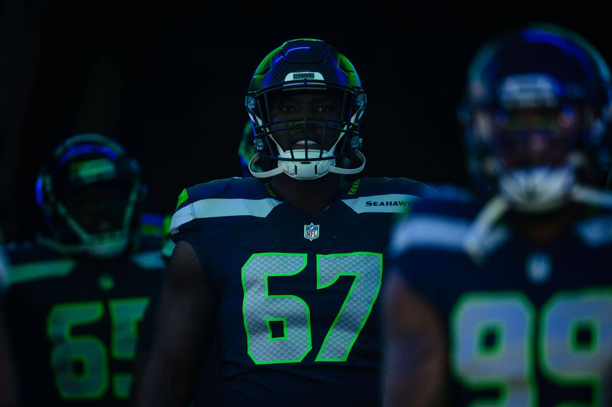 Seattle offensive lineman Charles Cross (67) looks on before the Seahawks take the field to face the Arizona Cardinals in an NFL game on Sunday, Nov. 24, 2024, at Lumen Field in Seattle. (Naji Saker / Tribune News Services)