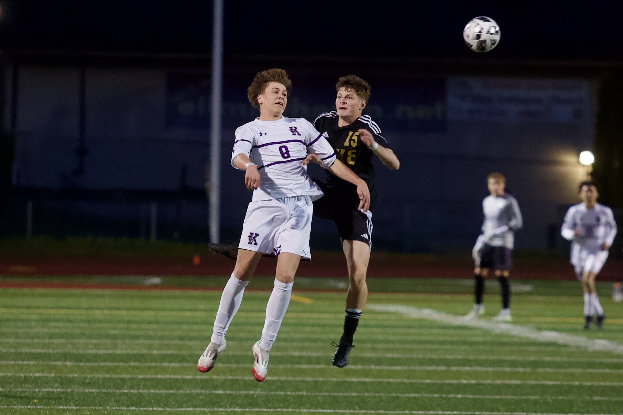 Kamiak senior Yegor Tarasov (left) jumps to head the ball Lake Stevens senior Shad Schmitt tries to defend him during Kamiak’s 2-1 win in Lake Stevens, Washington on April 29, 2025. (Joe Pohoryles / The Herald)