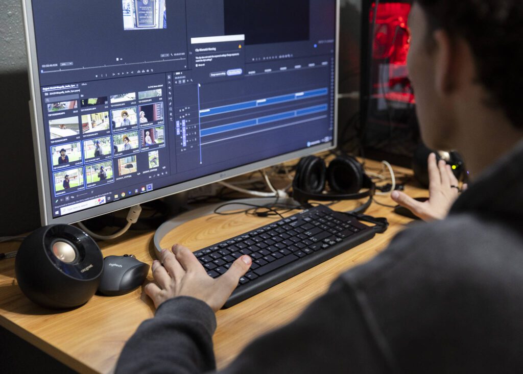 Dominick Jackson starts sifting through documentary footage at The Teen Storytellers Project on Tuesday, April 29, 2025 in Everett, Washington. (Olivia Vanni / The Herald)
