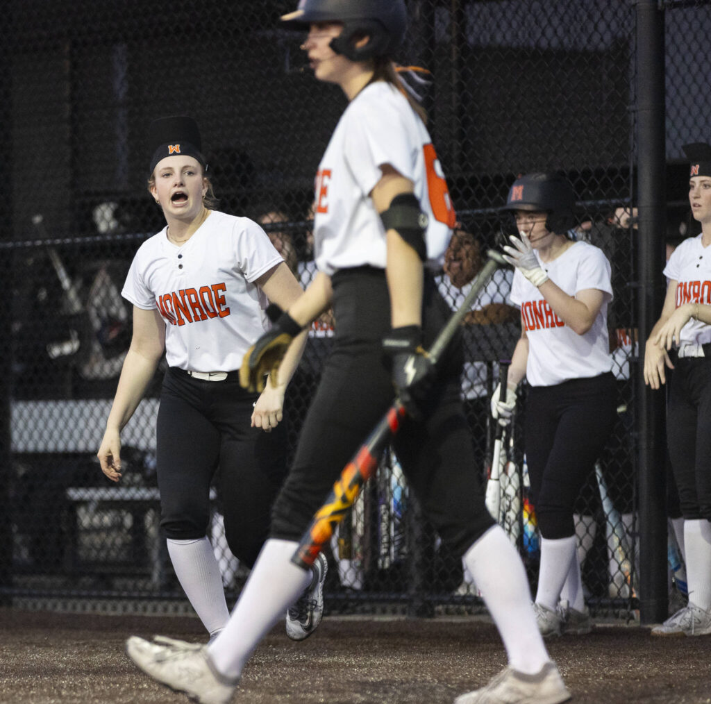 Monroe’s Scarlett Nagy yells encouragement to her teammate stepping up to the plate during the game against Stanwood on Thursday, May 1, 2025 in Monroe, Washington. (Olivia Vanni / The Herald)
