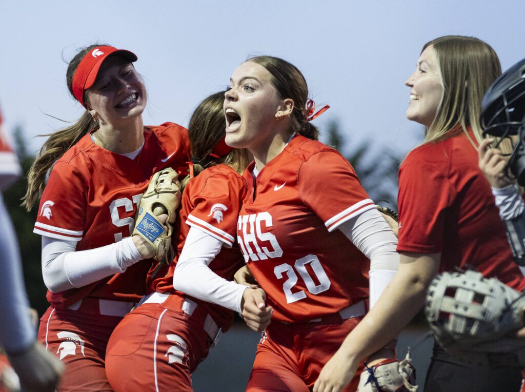 Stanwood’s Addi Anderson celebrates with her teammates after beating Monroe on Thursday, May 1, 2025 in Monroe, Washington. (Olivia Vanni / The Herald)
