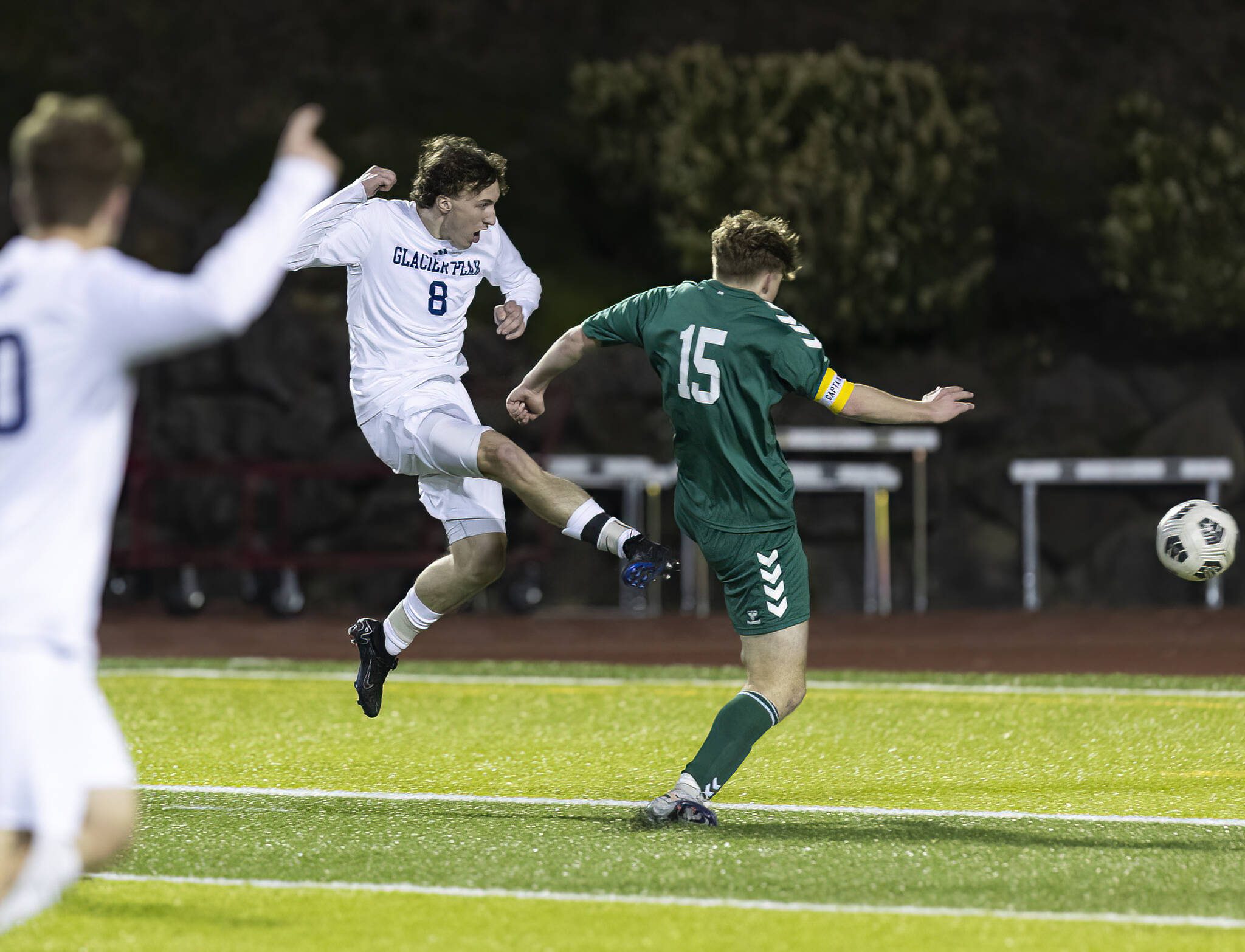 Glacier Peak’s Otto Nicholson takes a shot on goal during the game against Jackson on Tuesday, April 15, 2025 in Everett, Washington. (Olivia Vanni / The Herald)